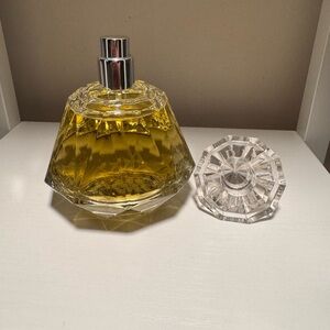 Elegant Yellow Perfume Bottle with Silver Cap